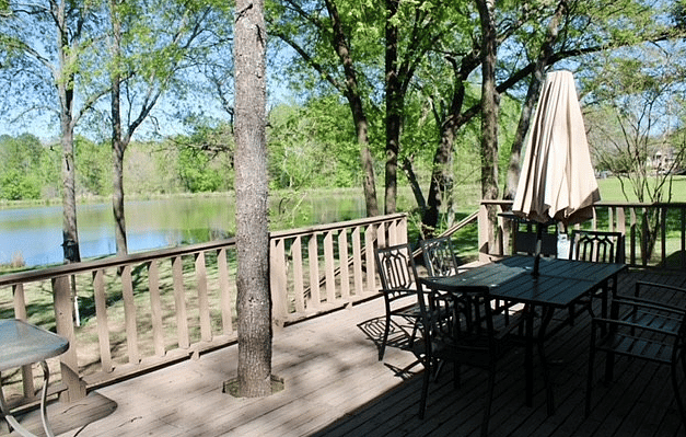 back deck as viewed just outside sliding door of one bedroom
