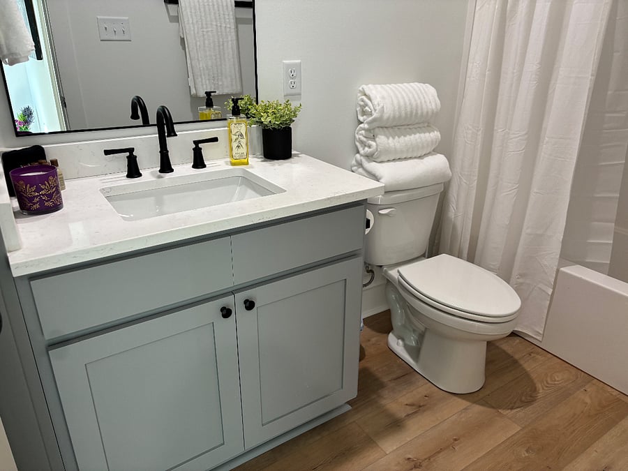 Guest bath adjacent to guest bedroom. Shower/Tub. Plush towels. Hair Dryer.