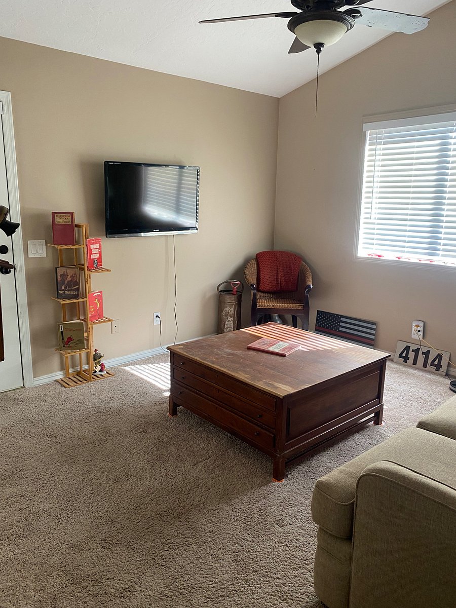 TV room with private entry door.