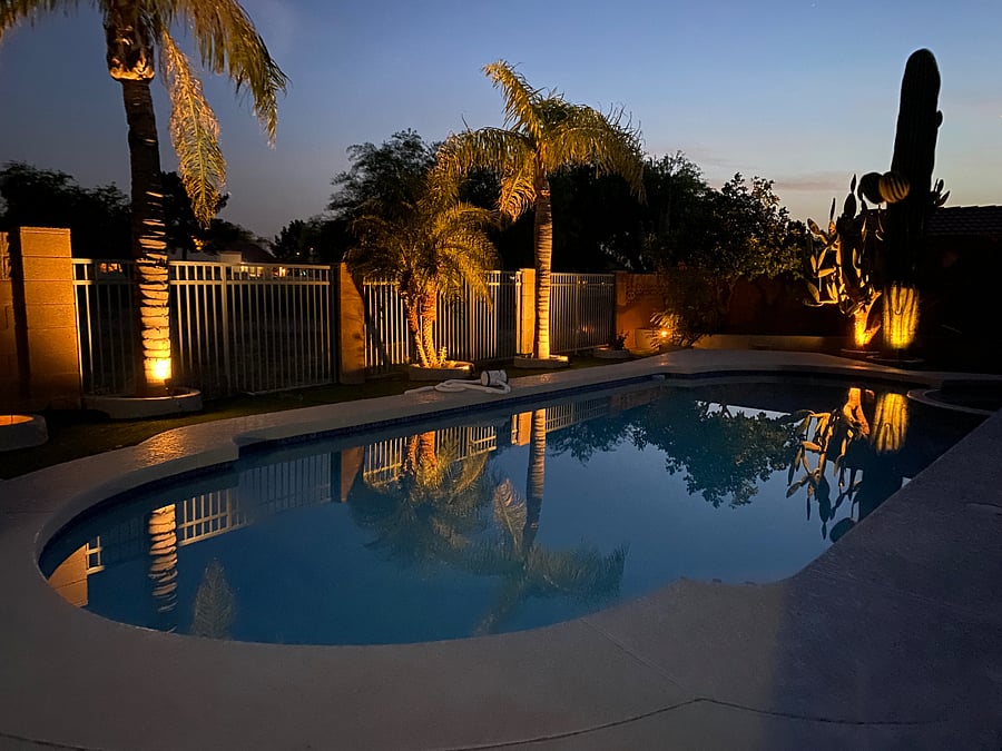 Pool with mood lighting on warm night is the best relaxing evening.