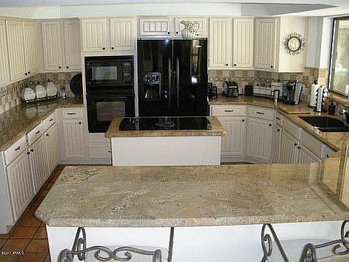 Shared kitchen, large pantry and two additional beverage refrigerators.