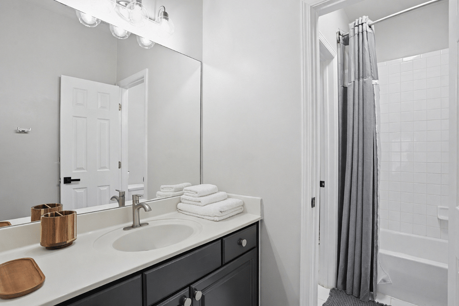 Shared Jack-and-Jill bathroom connecting two bedrooms for easy access.