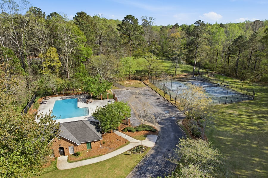 Access to neighborhood amenities including pool and tennis courts.