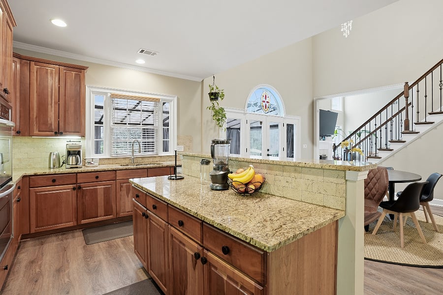 Kitchen and dining area with direct access to outdoor space, extending the living experience