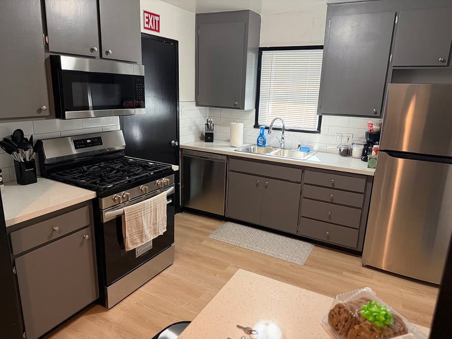 Enjoy a welcoming dining space with an oversized nook table, perfect for family meals, gatherings, or working comfortably in a warm, inviting setting.