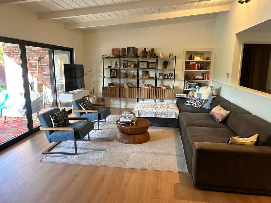 Open concept, living room connects to kitchen and dining room.