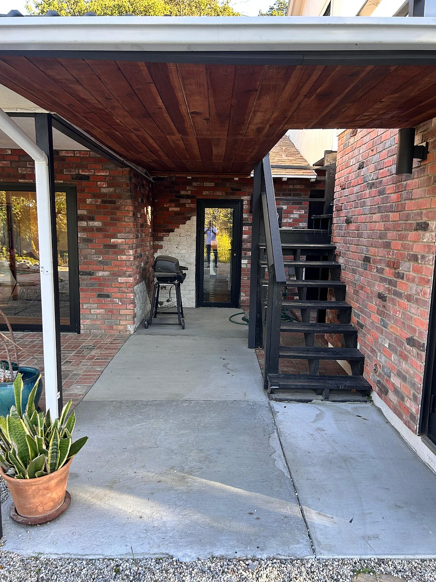 Stairs lead to upstairs private office space