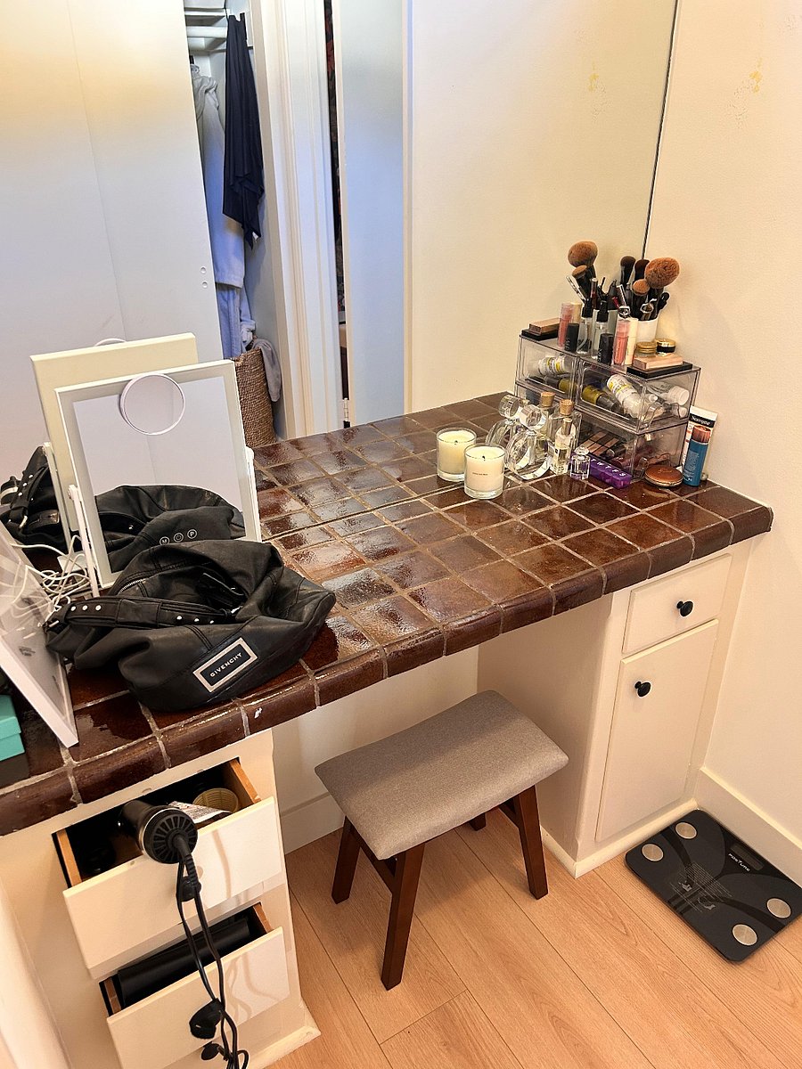 Master Bedroom Ensuite vanity room with full closet behind.