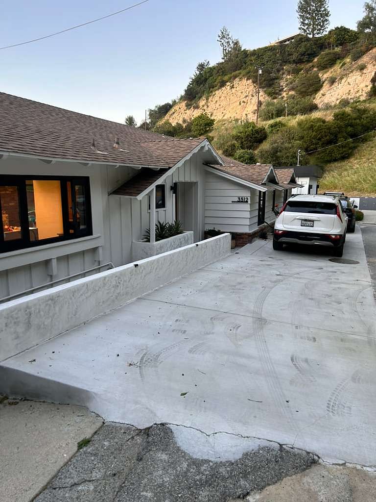 Parking pad fits 4 cars