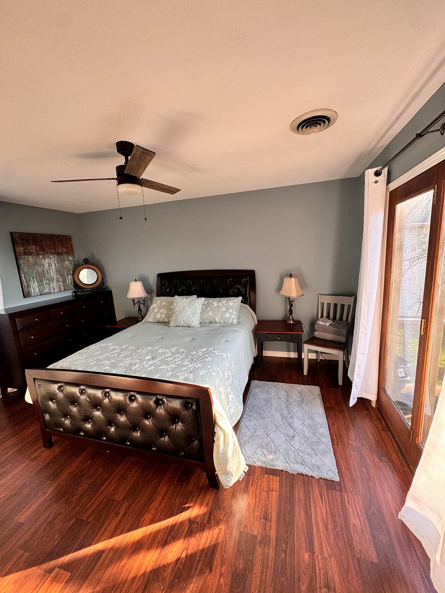 2nd Bedroom with Queen size bed and closet and vanity.