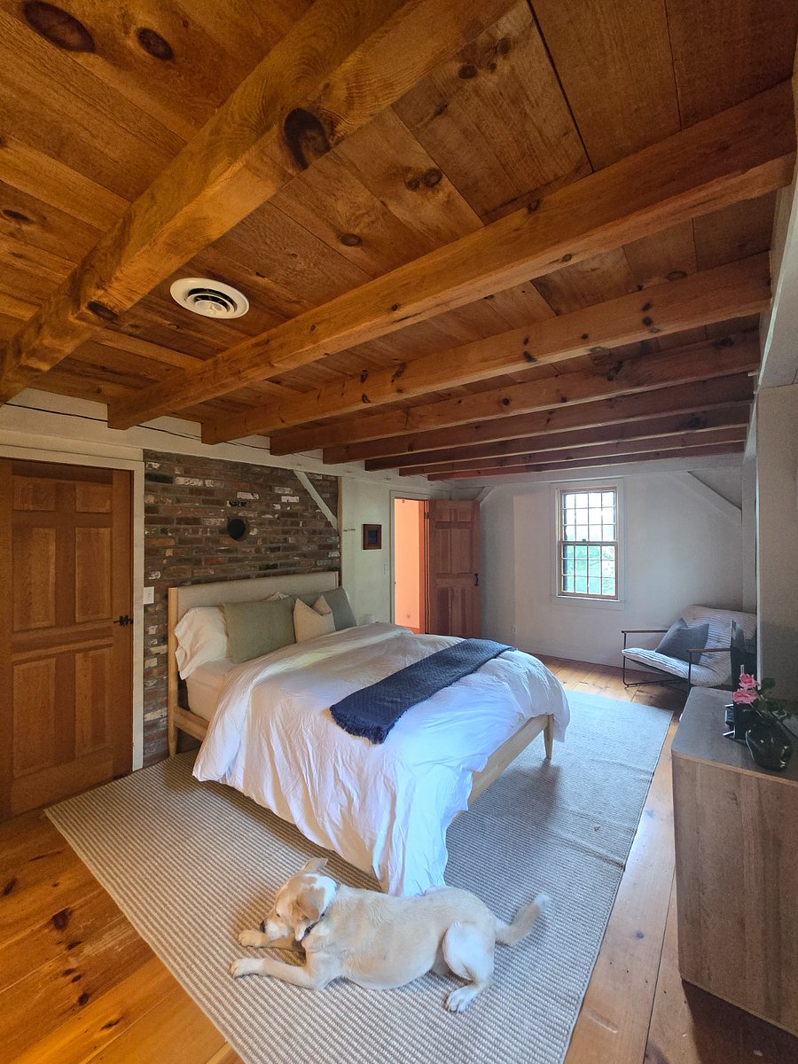 Primary bed with window facing the beach