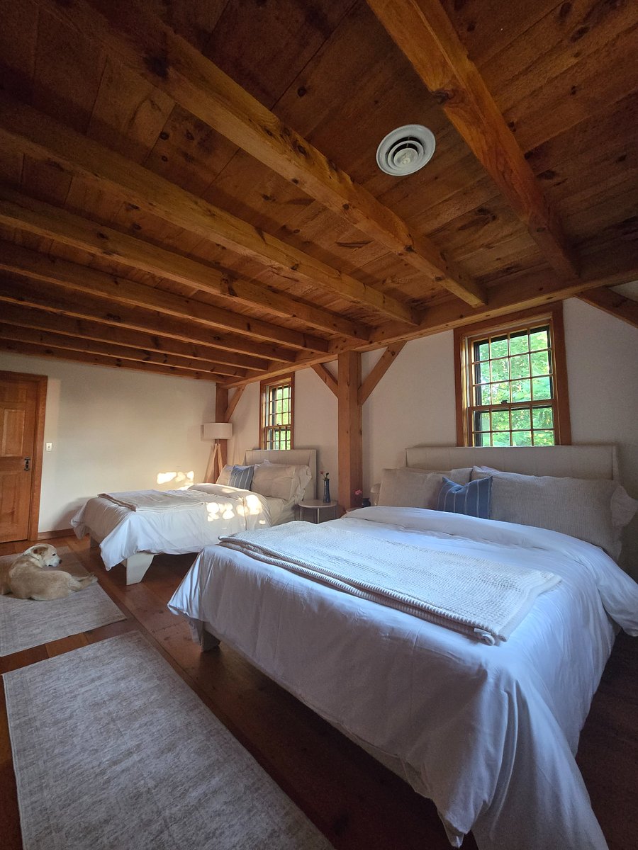 Second-floor second bedroom with two queen beds and walk-in closet