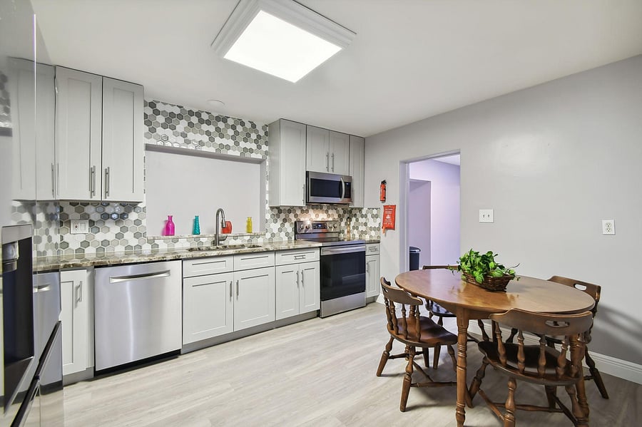 Totally updated kitchen with granite counter tops, stainless steel appliances and plenty of custom cabinets.