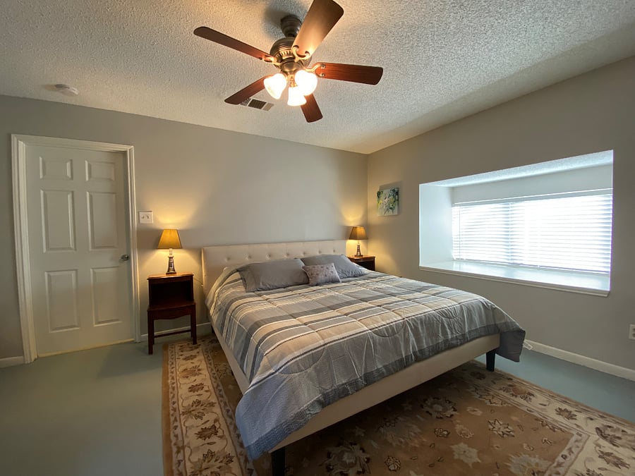 Master bedroom, featuring a King-sized bed.