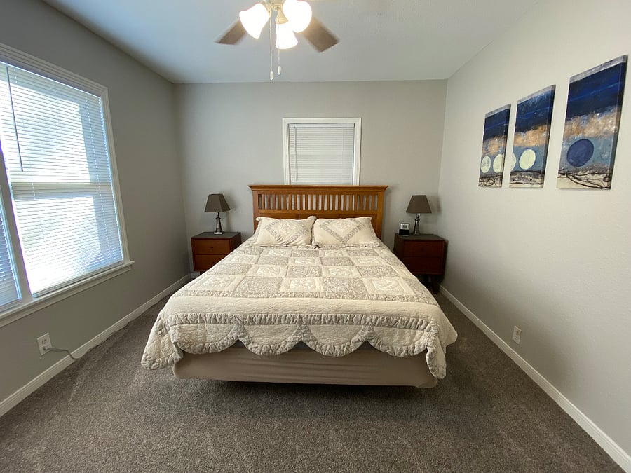 Queen bedroom, located next to the kids' room.