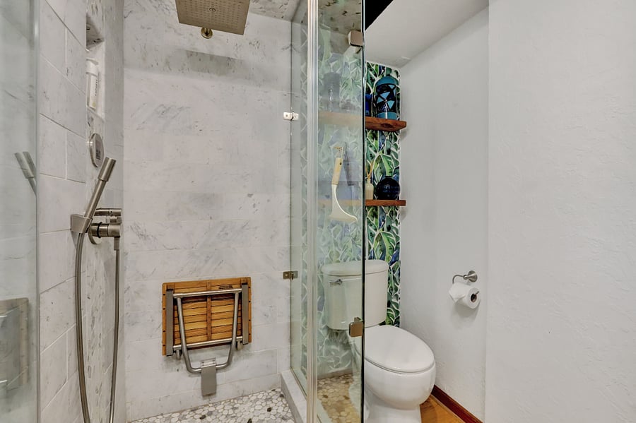 Shower has built in hot steam bath