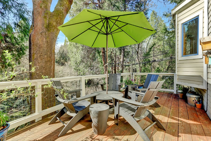 Private deck off living room that overlooks Deer Creek