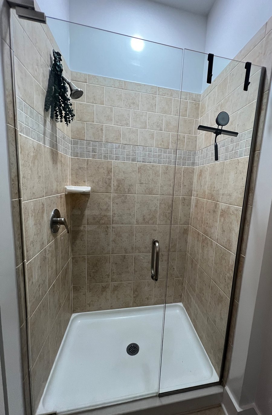 Shower with dried eucalyptus for a relaxing aromatherapy experience.