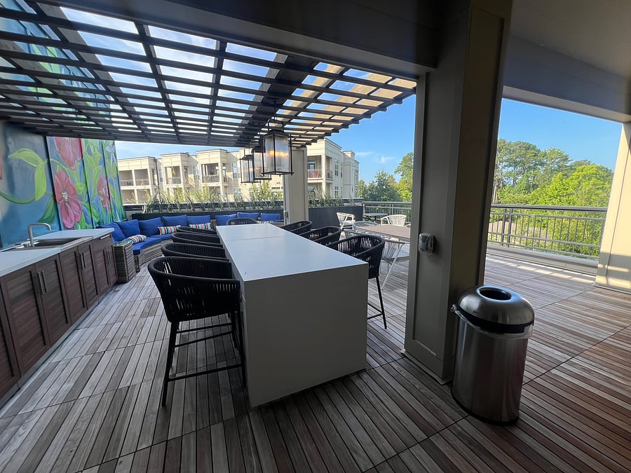 Rooftop deck with sink and plenty of seating