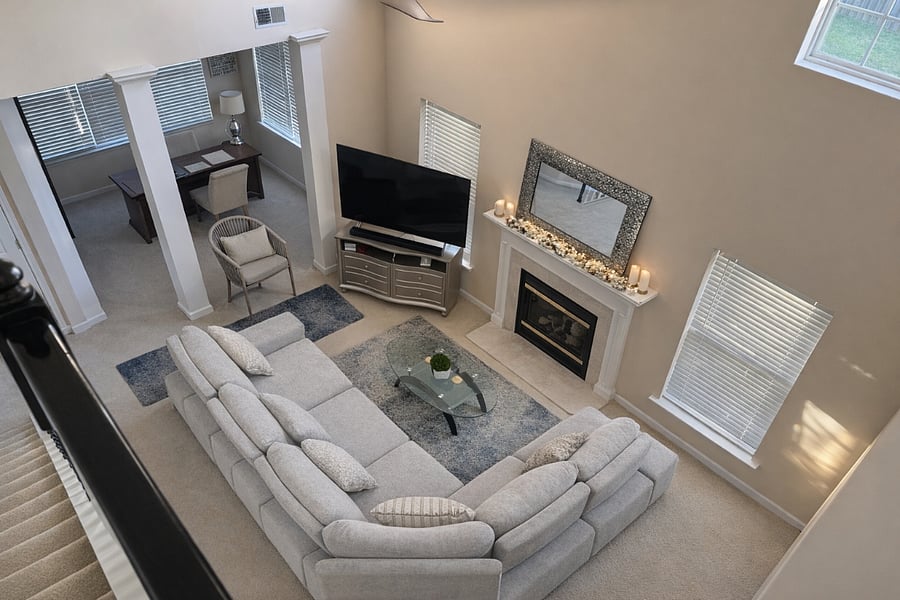 Comfortable shared living space with plenty of seating and natural light. 