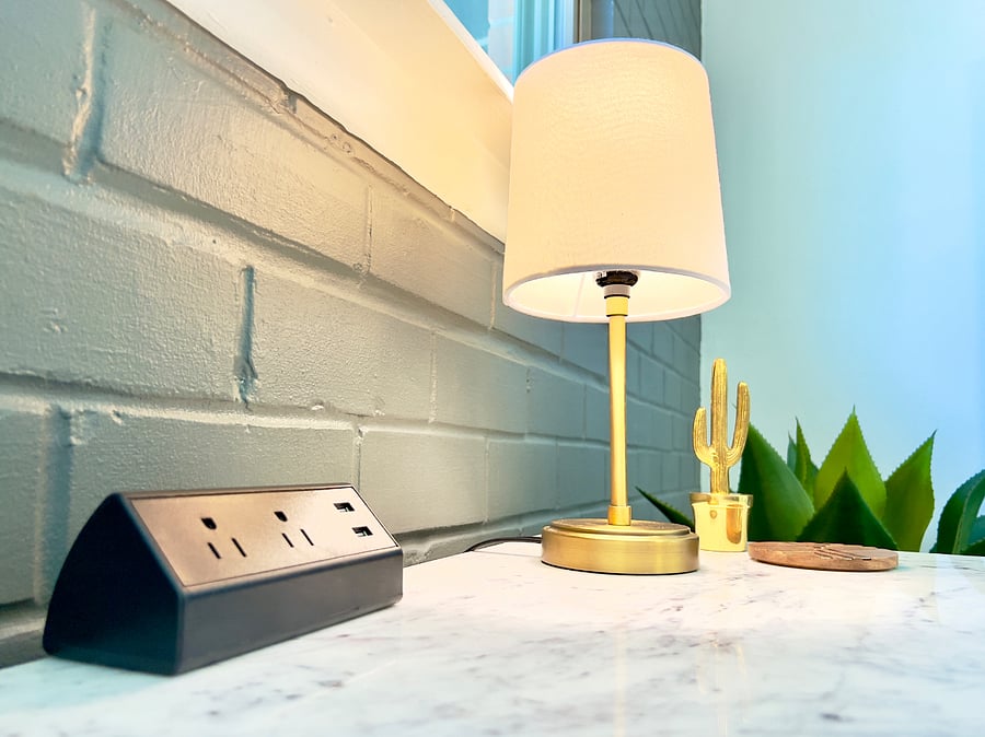 The desk in the office is ready for you to plug in and get to work.