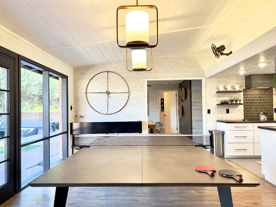 Have some fun in the game room with new stylish ping pong table, arcade and floor to ceiling windows overlooking the back yard.