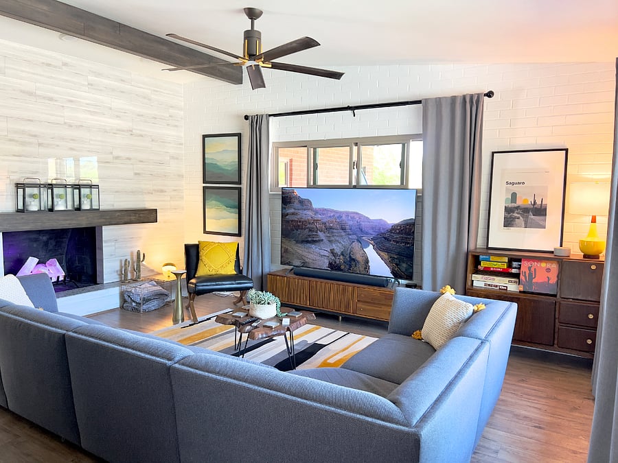 Plenty of seating in the family room with a 75 inch smart TV and Sonos sound system.