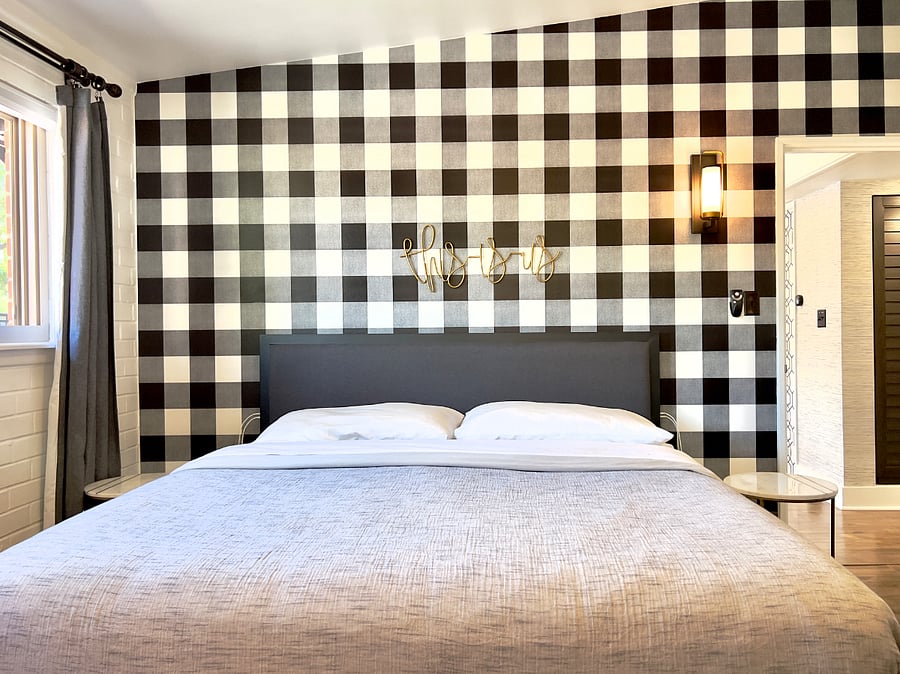 Two master suites with king beds, attached baths and tasteful decor.