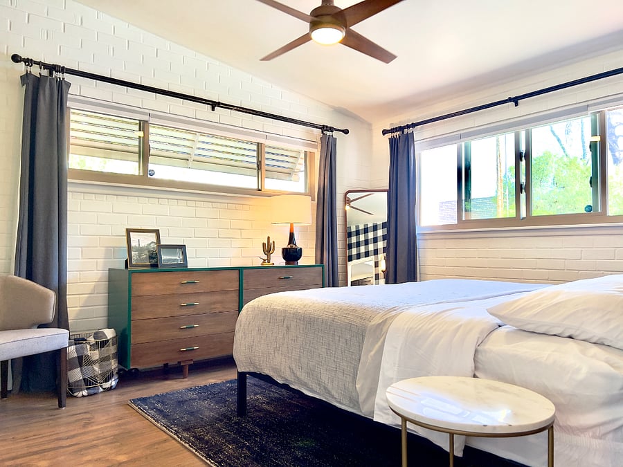 Two master suites with king beds, attached baths and tasteful decor.