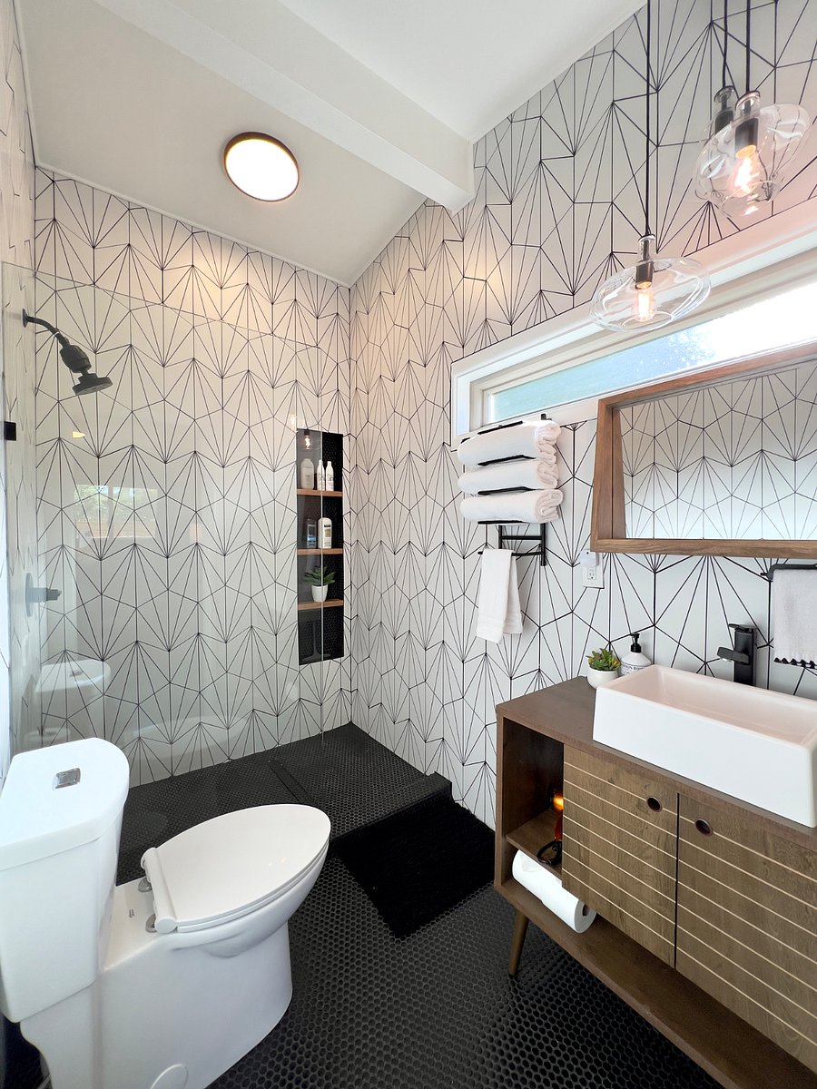 Two master suites with king beds, attached baths and tasteful decor.