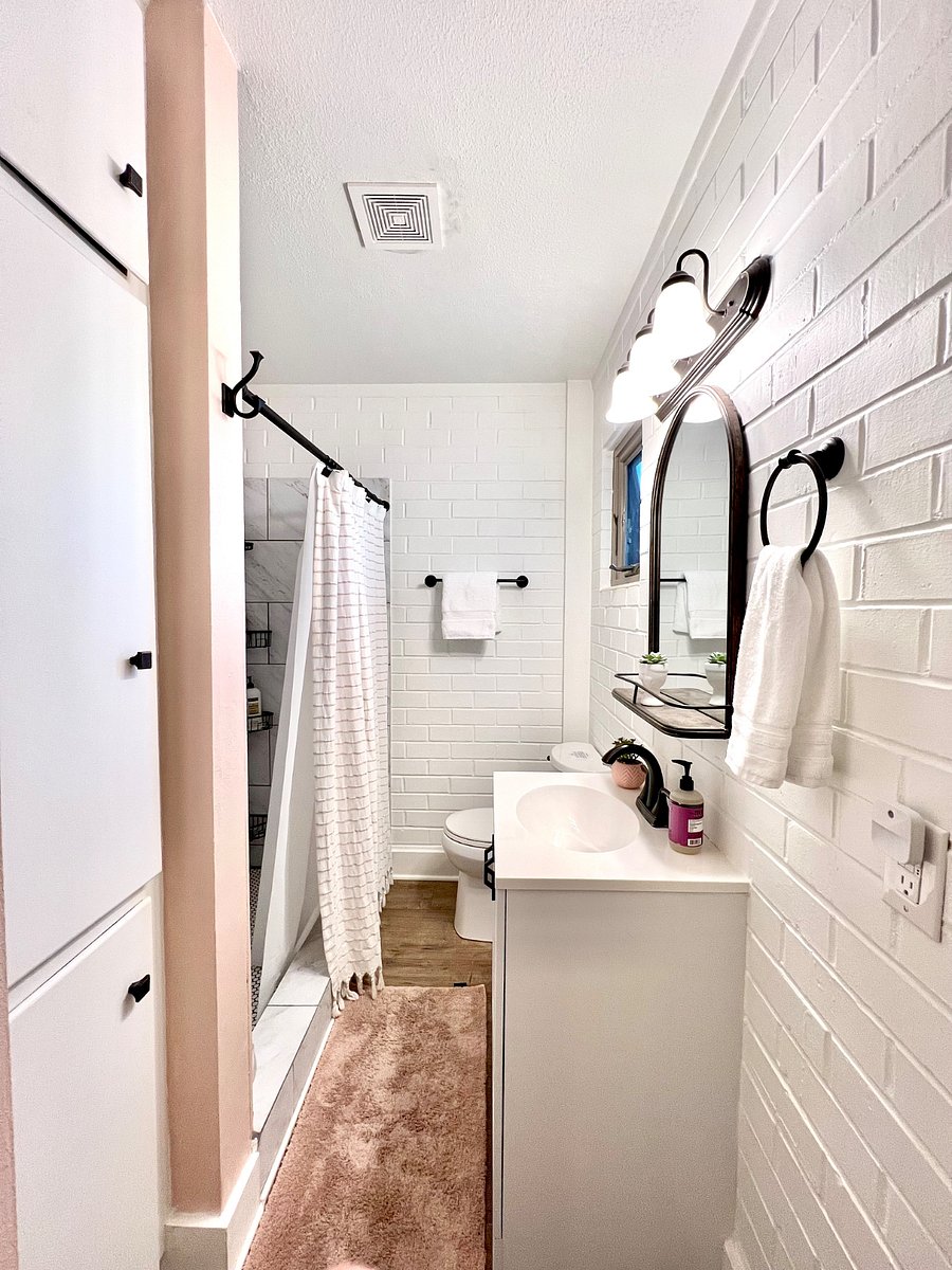 Two master suites with king beds, attached baths and tasteful decor.