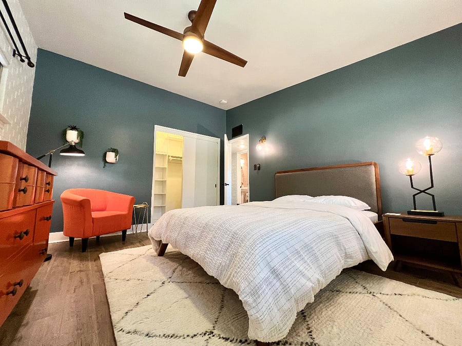 Queen bed in the third bedroom is across the hall from a third bathroom.