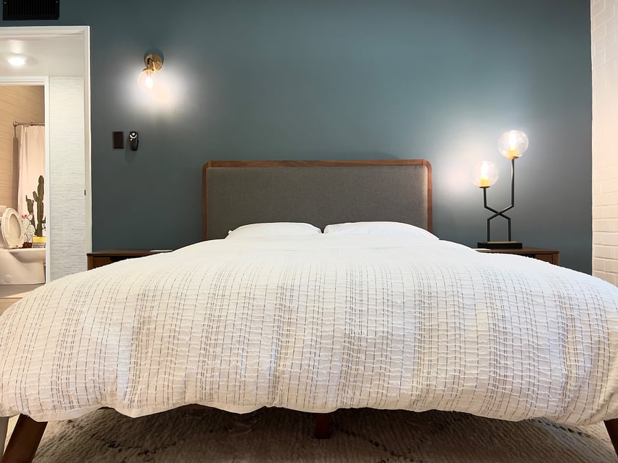 Queen bed in the third bedroom is across the hall from a third bathroom.