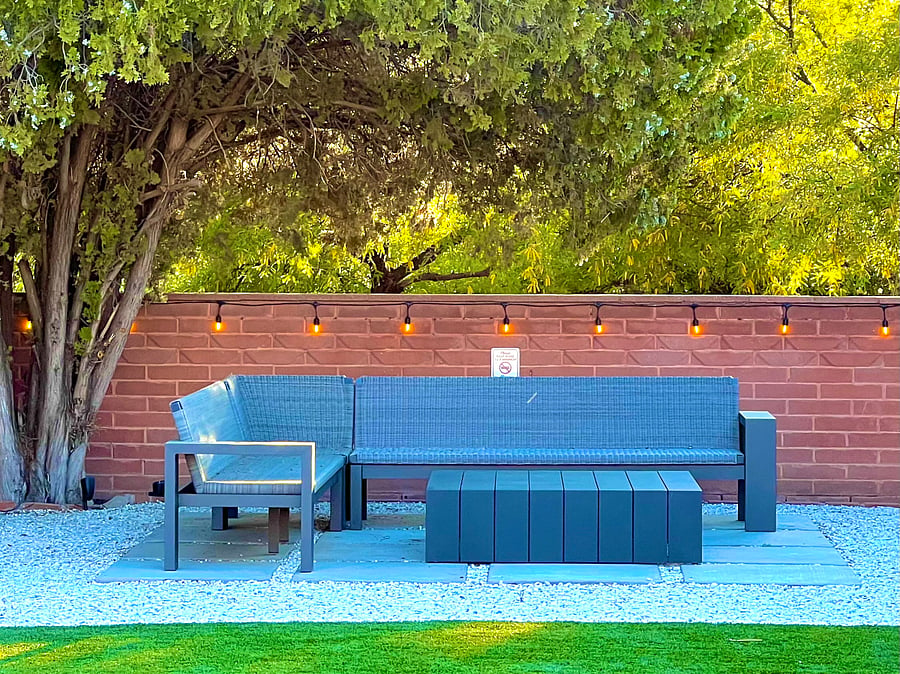Enjoy the sounds of nature in the private, manicured back yard.