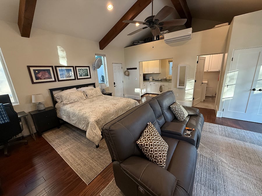 Queen size bed. Kitchenette adjacent.