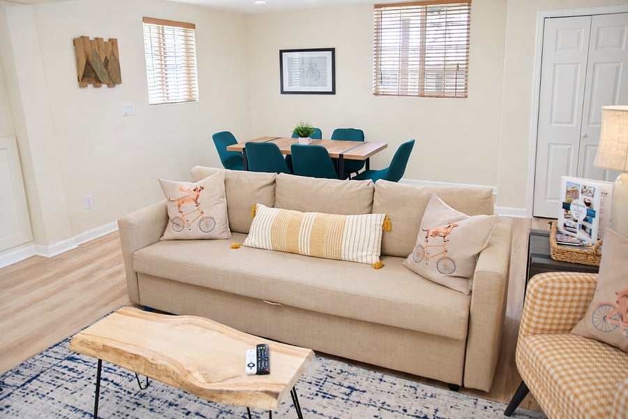 Unwind after a day of exploring in our bike-themed living room, featuring a Smart TV and cozy sleeper sofa.