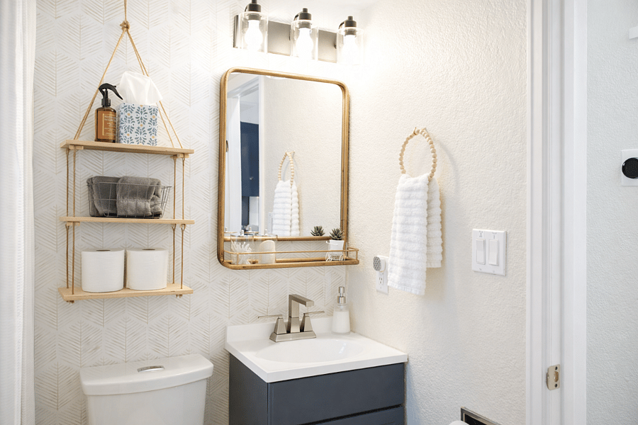 Full bathroom in Colorado Springs with a tub/shower combo, plush towels, and complimentary toiletries for your stay.