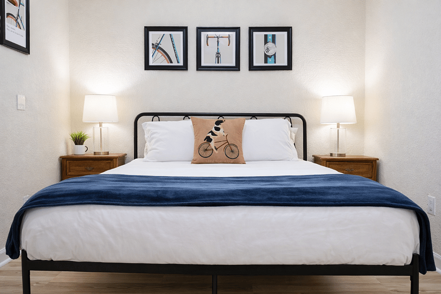 Quiet comfort near Pikes Peak: Our second guest room features a plush queen bed, blackout blinds, and soft lighting for a restful stay in Colorado Springs.