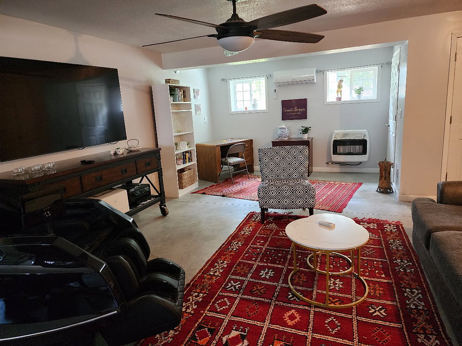 living room with office, mini-split and extra heating in case of power outage.