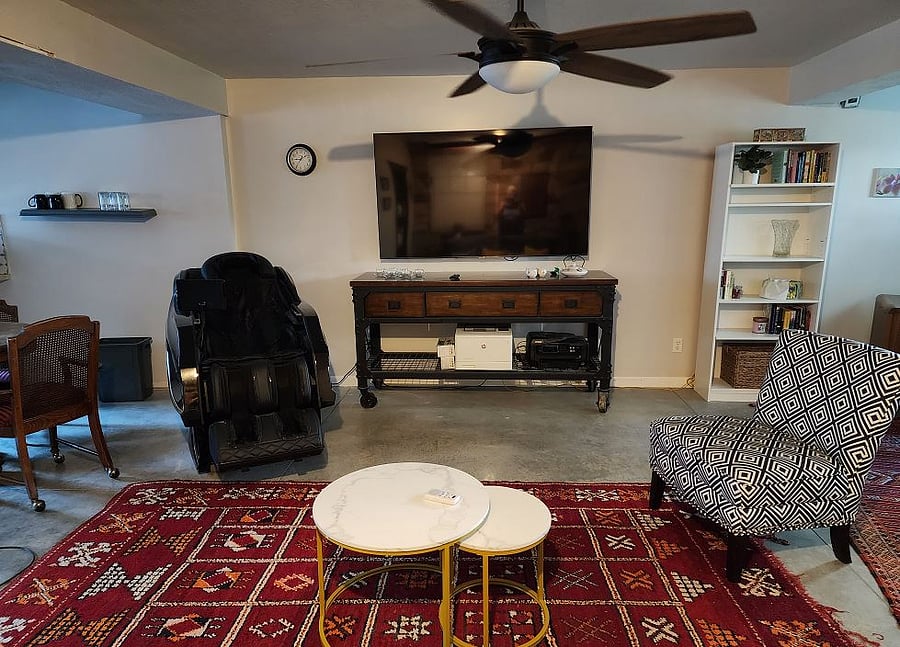 Large screen TV and massage chair for your relaxation.