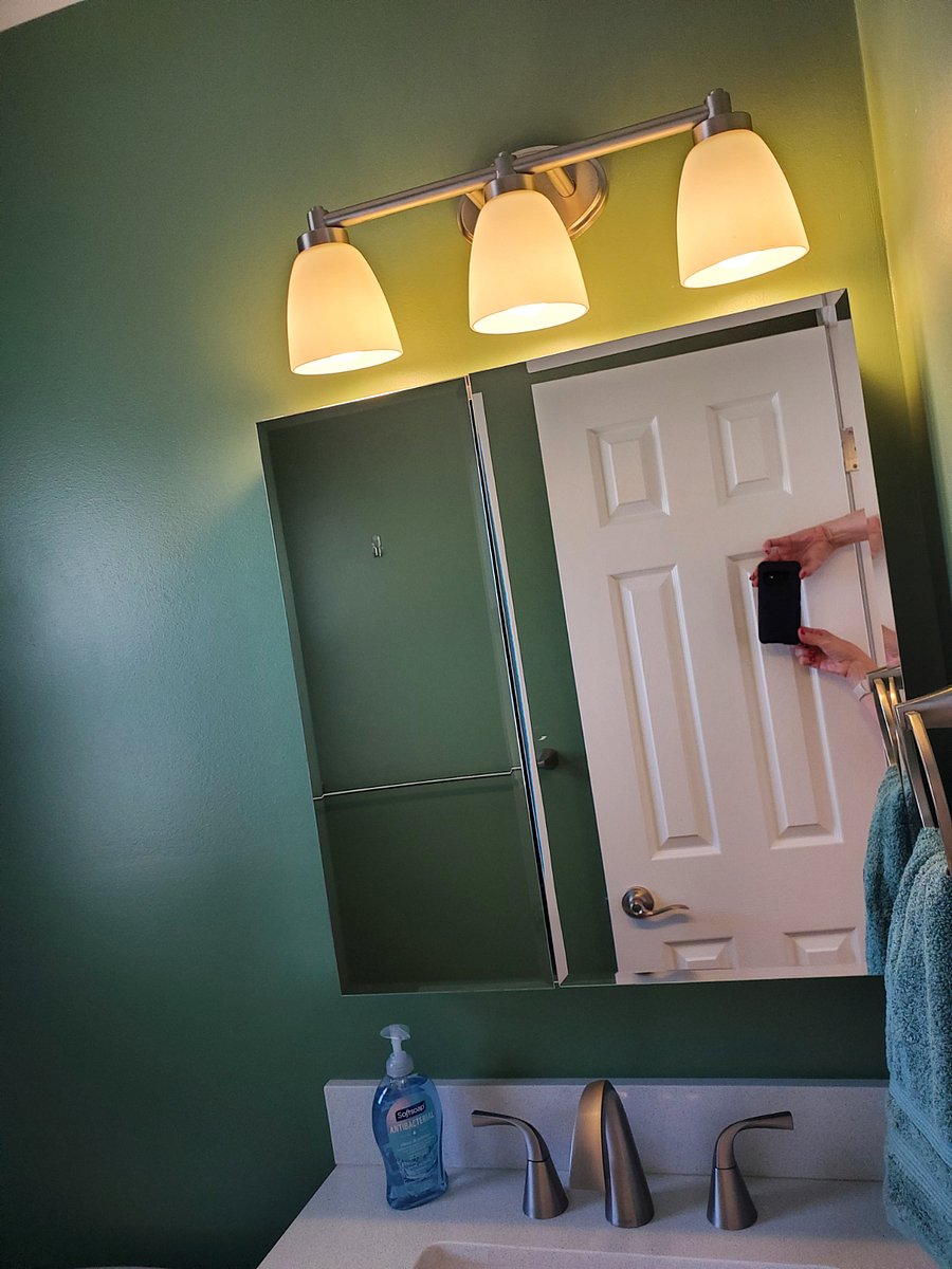 Primary bedroom half bath vanity.