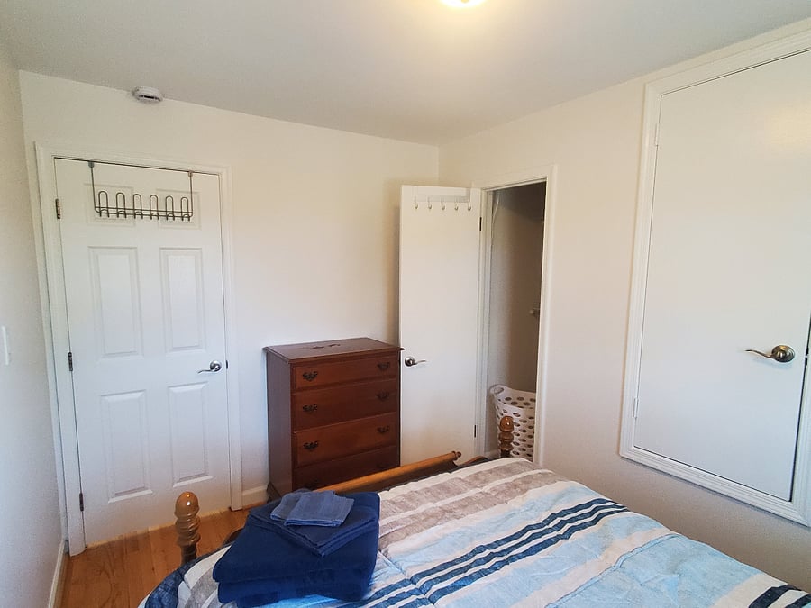 Dresser, Garment Hooks on Bedroom and Closet doors.