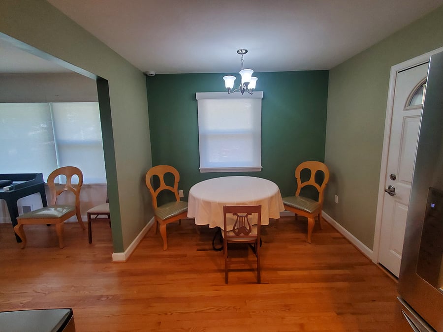 Dinning area; table may accommodate six people with the leaf inserted.