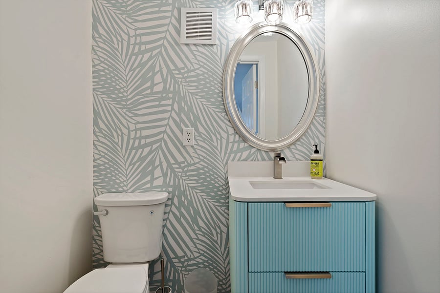 We added a brand new half bathroom in the sunroom, which is located off of the kitchen. It also serves as a convenient bathroom when you're enjoying the outdoors. 