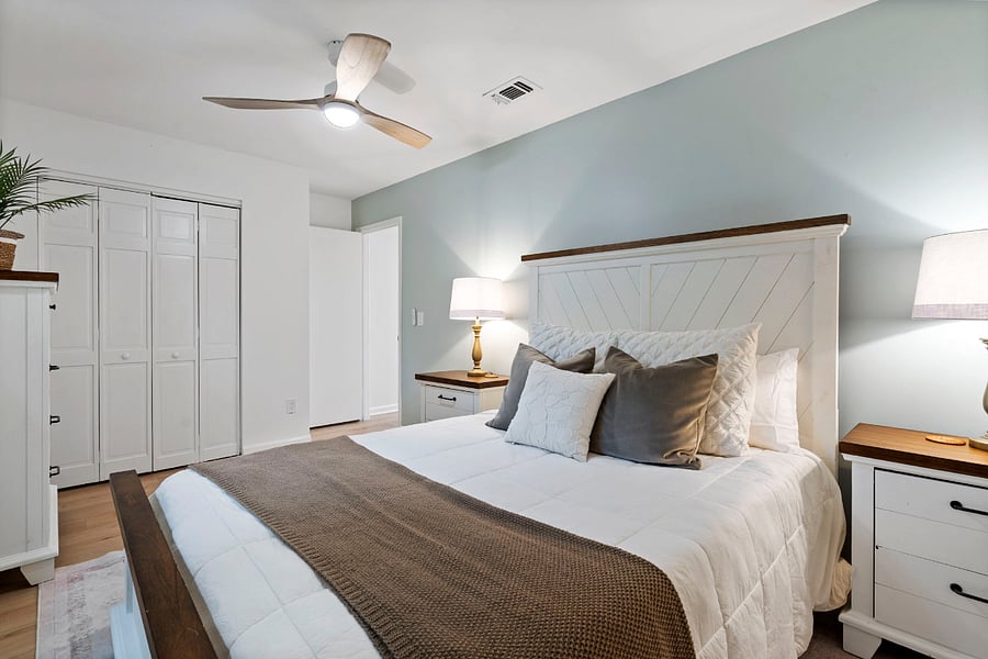 Bedroom number two is a quiet and peaceful place in the home with a queen size bed. 
