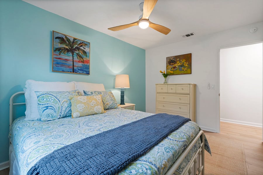 Bedroom number four has a large walk-in closet with tons of storage space. 