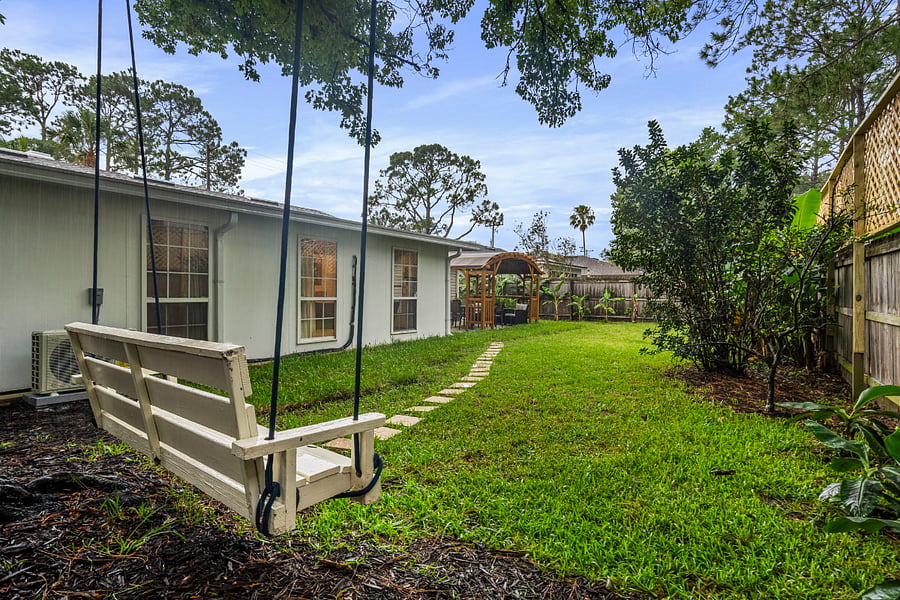 Enjoy hanging out in the backyard on the swing, playing croquet or corn hole! 