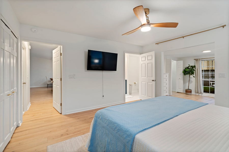 The primary bedroom has easy access into the family room and kitchen with extra wide doorways. 