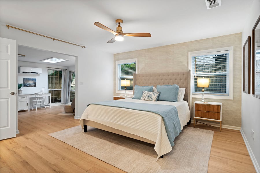 In the primary bedroom, you'll find extra wide doorways, an open and airy office/nursery space off the bedroom, and a beautiful, serene ambiance. 