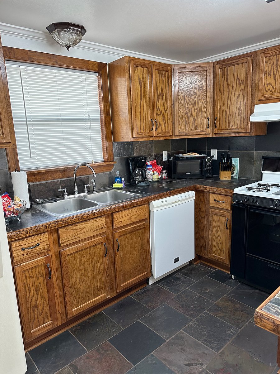fully stocked kitchen with dishwasher